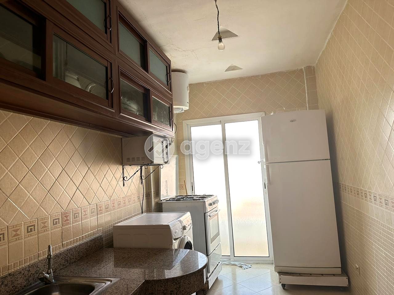Charmant Appartement de 2 chambres à vendre à My Abdellah — 3