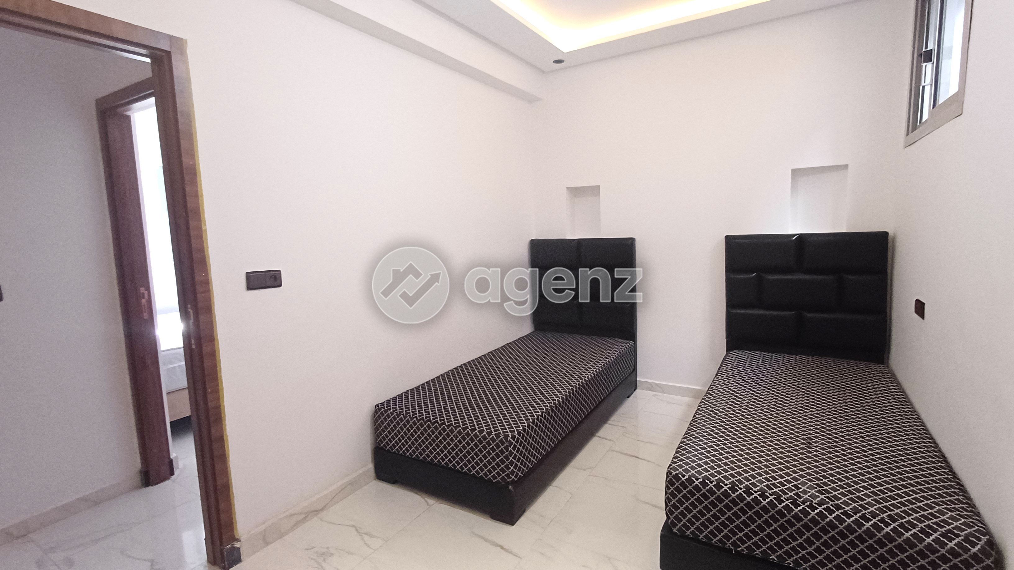 APPARTEMENT REFAIT À NEUF AVEC TERRASSE À MOULAY YOUSSEF — 3