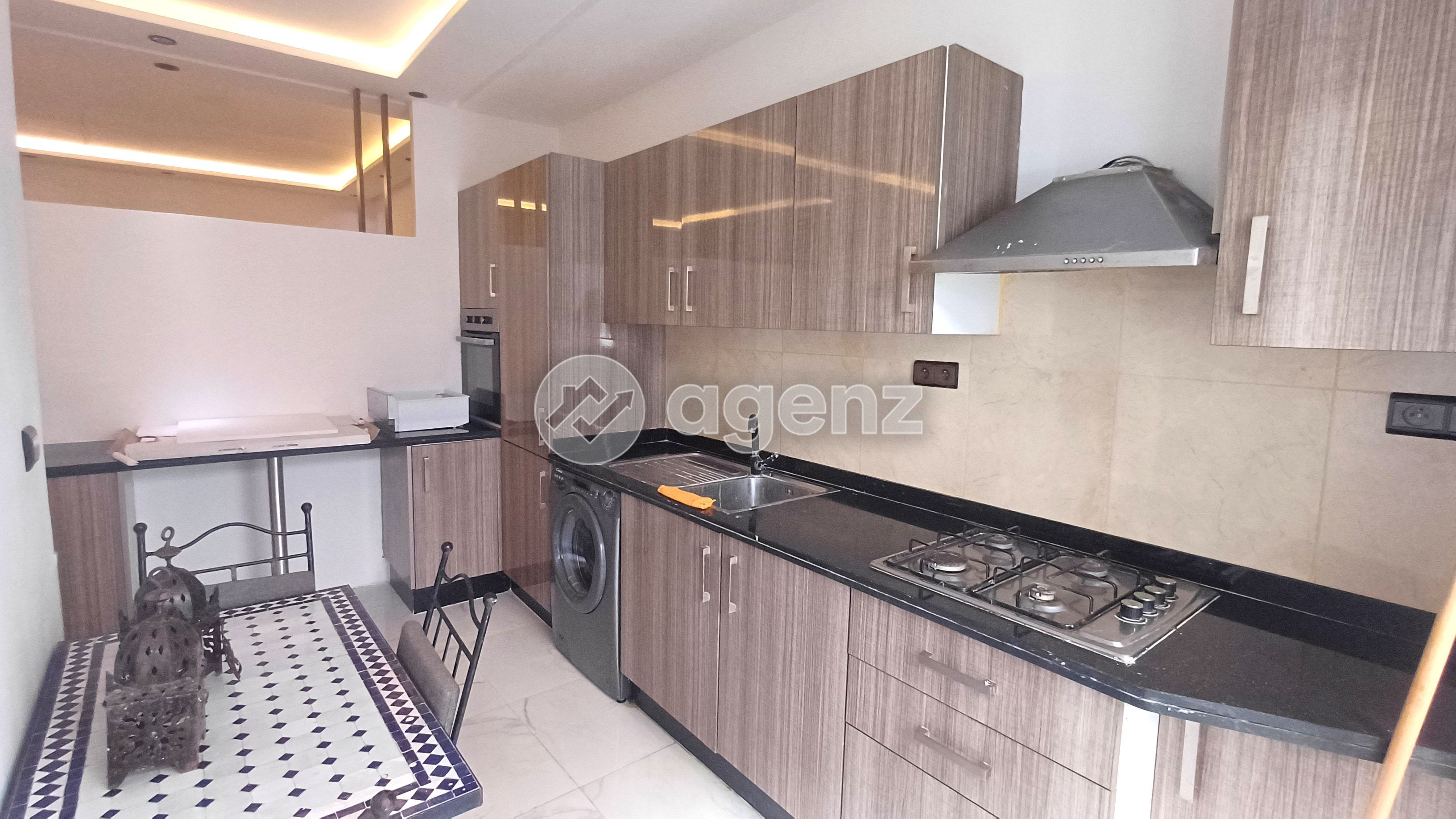 APPARTEMENT REFAIT À NEUF AVEC TERRASSE À MOULAY YOUSSEF — 4