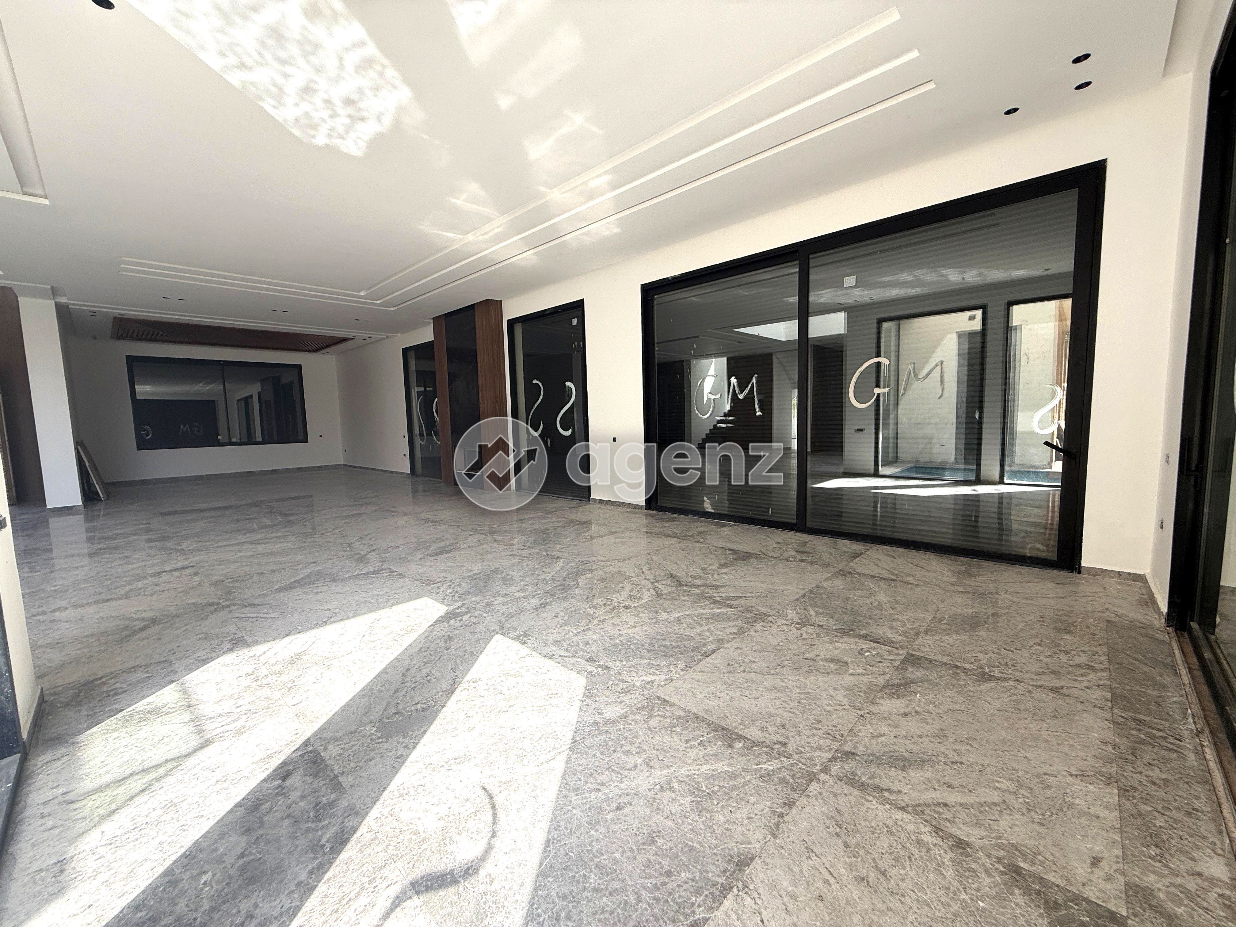 ARCHITECTURE CONTEMPORAINE ET PRESTIGE – VILLA D’EXCEPTION À VILLE VERTE — 4