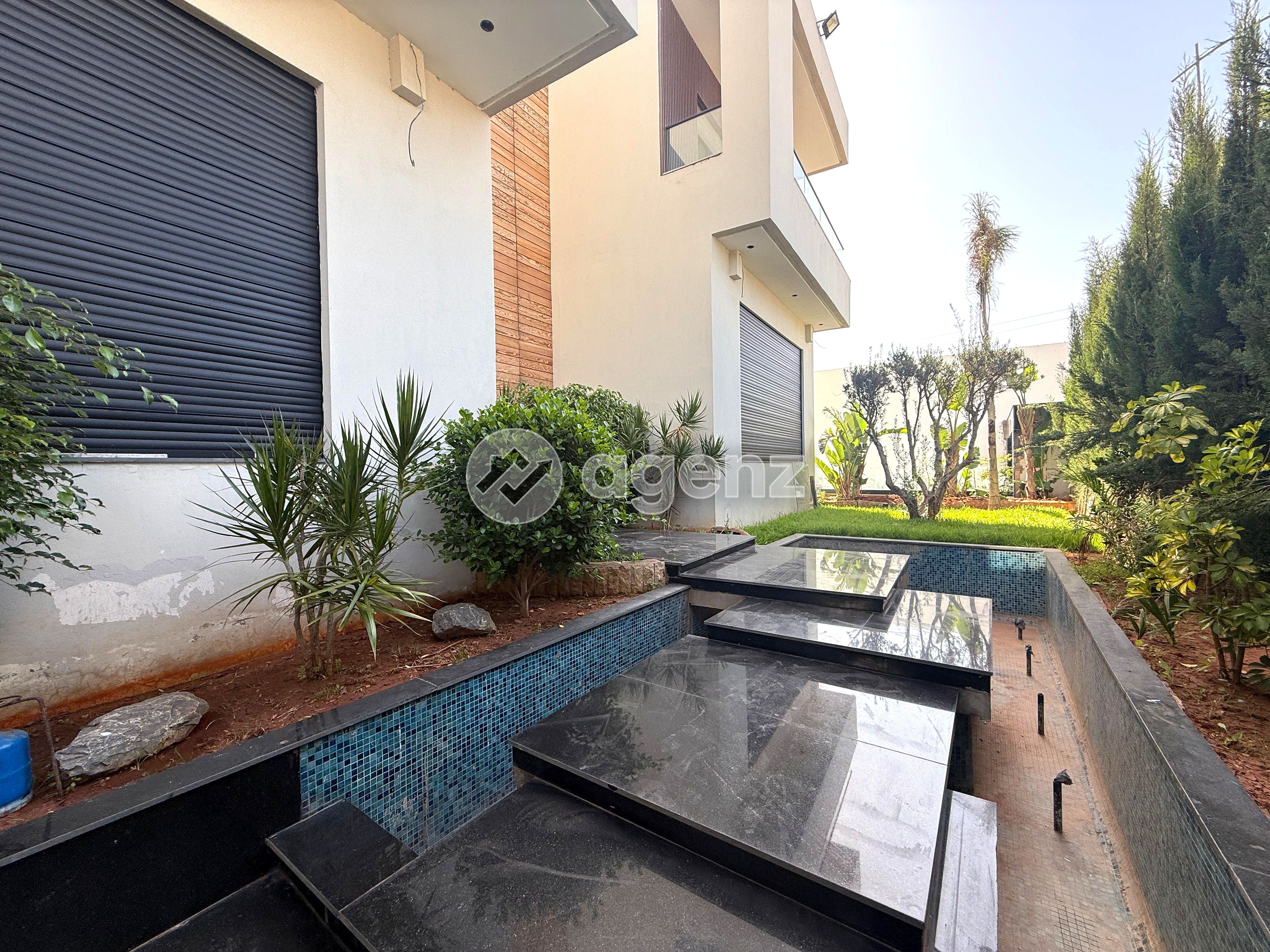 ARCHITECTURE CONTEMPORAINE ET PRESTIGE – VILLA D’EXCEPTION À VILLE VERTE — 2