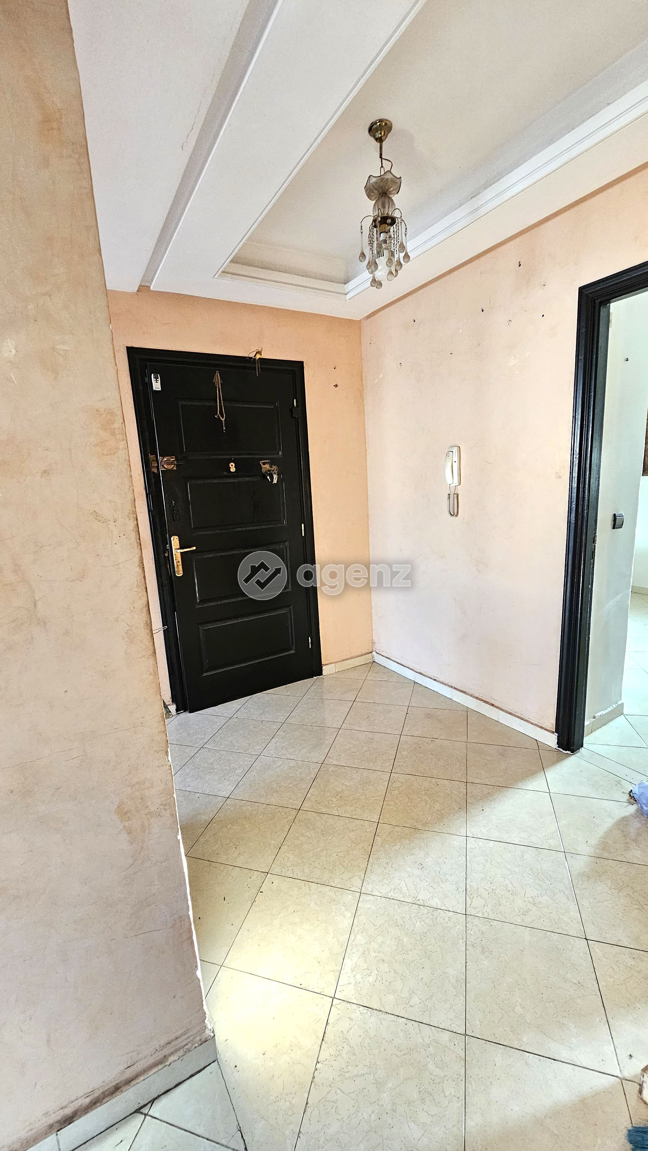 UN APPARTEMENT SIMPLE ET ACCUEILLANT — 4
