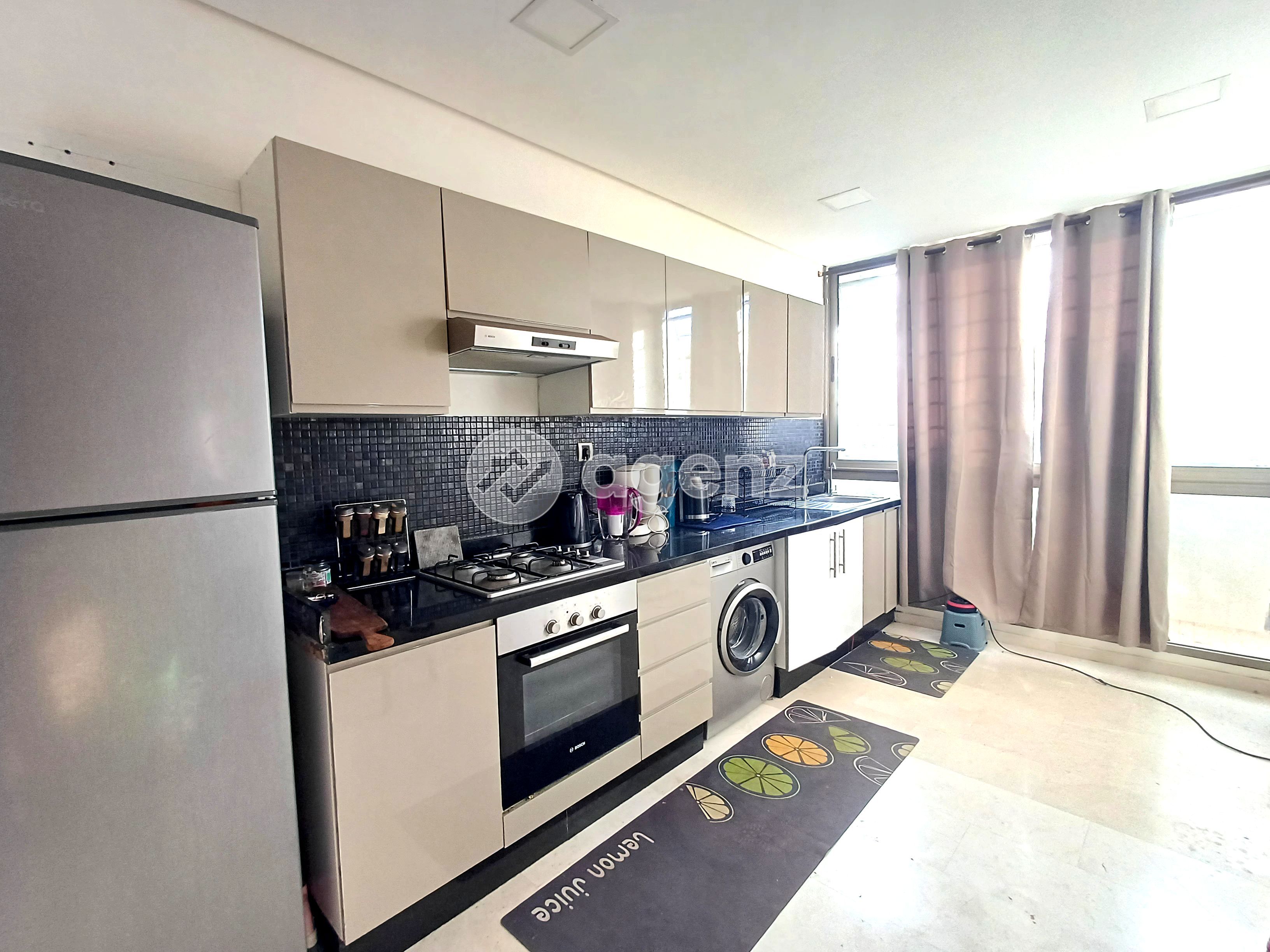 UN APPARTEMENT BIEN AGENCÉ ET FACILE À VIVRE — 3